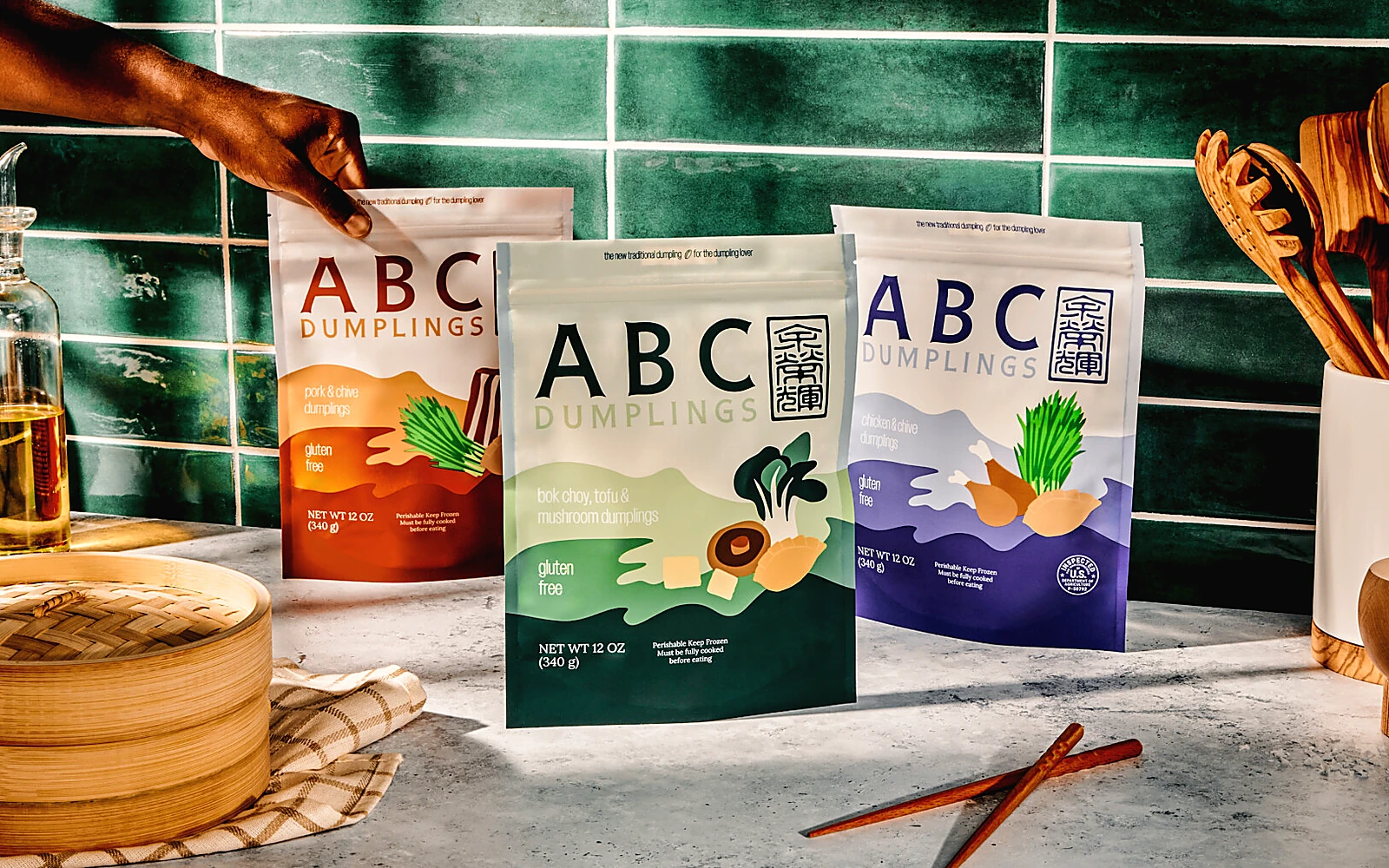 ABC Dumplings packages and ingredients in a clean kitchen setting for a farm-to-freezer dumpling supply chain article